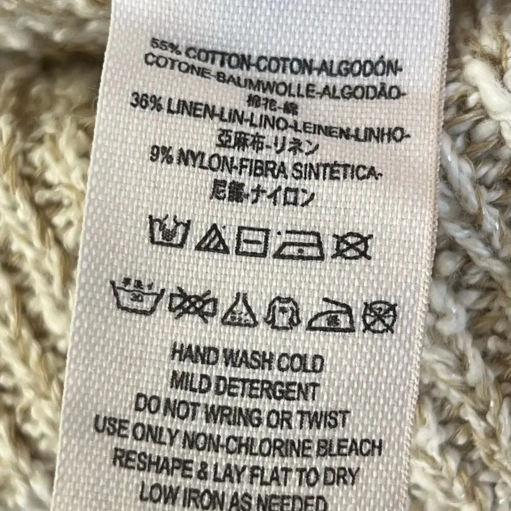 Free People. Women’s bouclé long sleeve cotton sweater